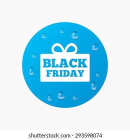 Water drops on button. Black friday gift sign icon. Sale symbol. Special offer label. Realistic pure raindrops. Blue circle. Vector