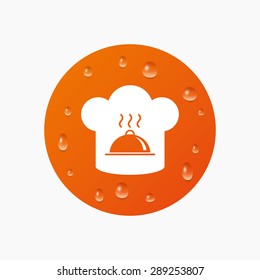 Water drops on button. Chef hat sign icon. Cooking symbol. Cooks hat with hot dish. Realistic pure raindrops. Orange circle. Vector