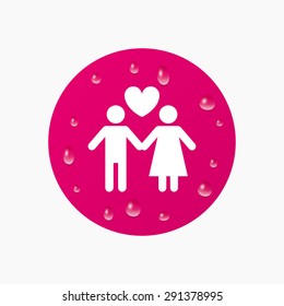 Water drops on button. Couple sign icon. Male love female. Lovers with heart. Realistic pure raindrops. Pink circle. Vector