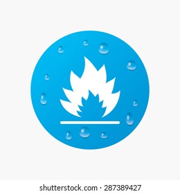 Water drops on button. Fire flame sign icon. Fire symbol. Stop fire. Escape from fire. Realistic pure raindrops. Blue circle. Vector