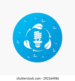 Water drops on button. Fluorescent lamp bulb with leaves sign icon. Energy saving. Economy symbol. Realistic pure raindrops. Blue circle. Vector