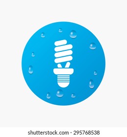 Water drops on button. Fluorescent lamp bulb sign icon. Energy saving. Idea and success symbol. Realistic pure raindrops. Blue circle. Vector