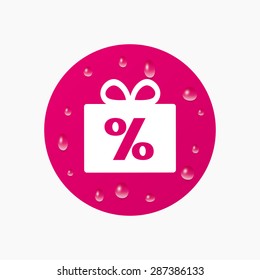 Water drops on button. Gift box sign discount icon. Present symbol. Realistic pure raindrops. Pink circle. Vector