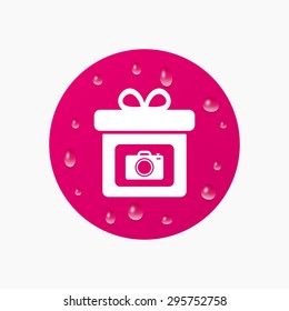 Water drops on button. Gift box sign icon. Present with photo camera symbol. Realistic pure raindrops. Pink circle. Vector