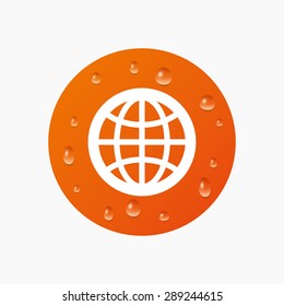 Water drops on button. Globe sign icon. World symbol. Realistic pure raindrops. Orange circle. Vector