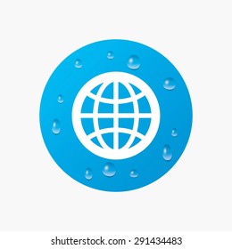 Water drops on button. Globe sign icon. World symbol. Realistic pure raindrops. Blue circle. Vector