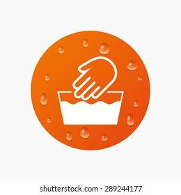 Water drops on button. Hand wash sign icon. Not machine washable symbol. Realistic pure raindrops. Orange circle. Vector