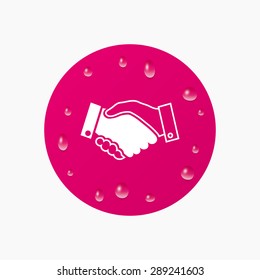 Water drops on button. Handshake sign icon. Successful business symbol. Realistic pure raindrops. Pink circle. Vector