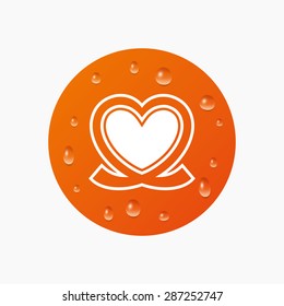 Water drops on button. Heart ribbon sign icon. Love symbol. Realistic pure raindrops. Orange circle. Vector