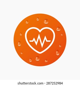 Water drops on button. Heartbeat sign icon. Cardiogram symbol. Realistic pure raindrops. Orange circle. Vector