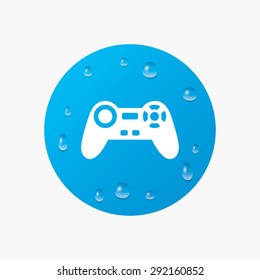 Water drops on button. Joystick sign icon. Video game symbol. Realistic pure raindrops. Blue circle. Vector