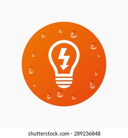 Water drops on button. Light lamp sign icon. Bulb with lightning symbol. Idea symbol. Realistic pure raindrops. Orange circle. Vector