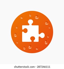 Water drops on button. Puzzle piece sign icon. Strategy symbol. Realistic pure raindrops. Orange circle. Vector