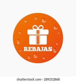 Water drops on button. Rebajas - Discounts in Spain sign icon. Gift box with ribbons symbol. Realistic pure raindrops. Orange circle. Vector