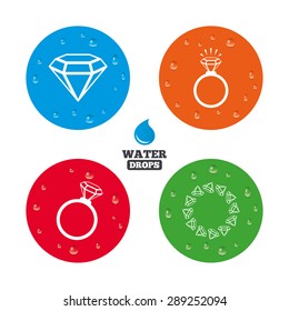 Water drops on button. Rings icons. Jewelry with shine diamond signs. Wedding or engagement symbols. Realistic pure raindrops on circles. Vector