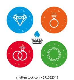 Water drops on button. Rings icons. Jewelry with shine diamond signs. Wedding or engagement symbols. Realistic pure raindrops on circles. Vector