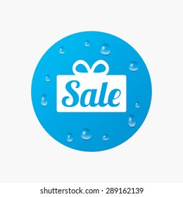 Water drops on button. Sale gift box sign icon. Special offer symbol. Realistic pure raindrops. Blue circle. Vector