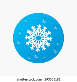 Water drops on button. Snowflake artistic sign icon. Christmas and New year winter symbol. Air conditioning symbol. Realistic pure raindrops. Blue circle. Vector