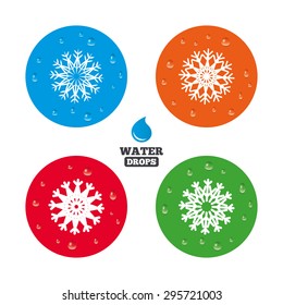 Water drops on button. Snowflakes artistic icons. Air conditioning signs. Christmas and New year winter symbols. Frozen weather. Realistic pure raindrops on circles. Vector