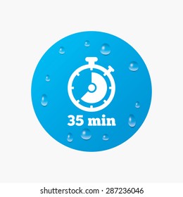 Water drops on button. Timer sign icon. 35 minutes stopwatch symbol. Realistic pure raindrops. Blue circle. Vector