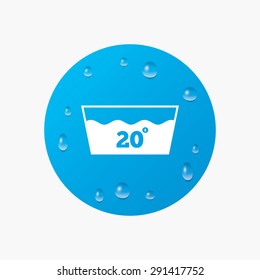 Water drops on button. Wash icon. Machine washable at 20 degrees symbol. Realistic pure raindrops. Blue circle. Vector