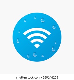 Water drops on button. Wifi sign. Wi-fi symbol. Wireless Network icon. Wifi zone. Realistic pure raindrops. Blue circle. Vector