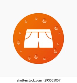 Water drops on button. Women's sport shorts sign icon. Clothing symbol. Realistic pure raindrops. Orange circle. Vector