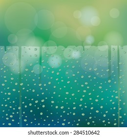 Water Drops on Glass Green Blur Background with Horizontal Space, Rainy Season, Monsoon