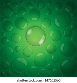 water drops on green background vector