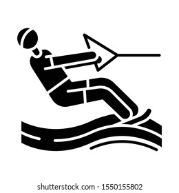 Water skiing glyph icon. Surface watersport. Summer leisure and dangerous hobby. Recreational outdoor activity. Man wakeboarding. Silhouette symbol. Negative space. Vector isolated illustration