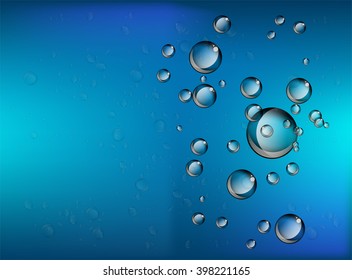 Water soap bubble rising on blue background. 