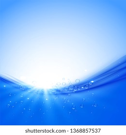 water wave and bubbles with sun rays background