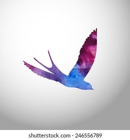Watercolor bird. Paint silhouette of a swallow. Beautiful stain and texture of a painted paper. 