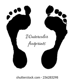 Watercolor black prints of children foots. Vector illustration.