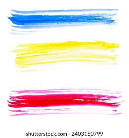 Watercolor brushes blue, yellow and red on a white background.