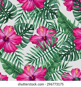 Watercolor hibiscus flower and palm leaves seamless pattern. Vector illustration.