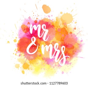 Watercolor imitation paint splash background with handwritten modern calligraphy message "Mr & Mrs". Wedding concept.