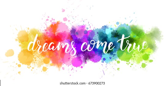 Watercolor imitation splash blot with inspirational quote "dreams come true". Handwritten calligraphy text.