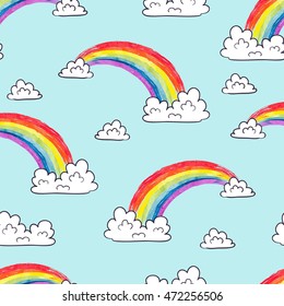 Watercolor rainbows and clouds seamless pattern. Colorful cartoon vector sky background.