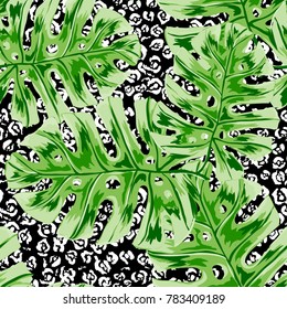 Watercolor seamless pattern with tropical leaves: palms, monstera, passion fruit. Beautiful allover print with hand drawn exotic plants. Swimwear botanical design. Vector.
