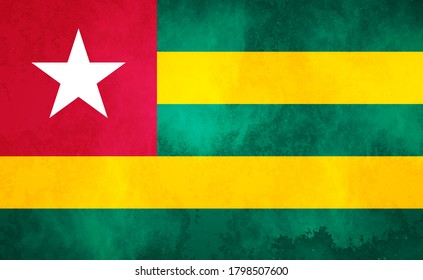 Watercolor texture flag of Togo. Creative grunge flag of Togo country with shining background