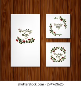 Watercolor texture wedding cards on a wooden background texture
