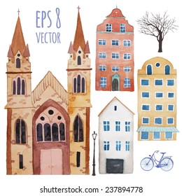 Watercolor town objects set. Hand drawn isolated illustrations in vector: buildings, trees, lamps, catholic church and flying balloon in sky. Vector design elements