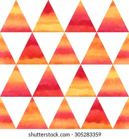 Watercolor triangles abstract seamless vector pattern. Fire or sunset tropical bright colors - red, orange, pink, yellow. Hand drawn geometrical texture.
