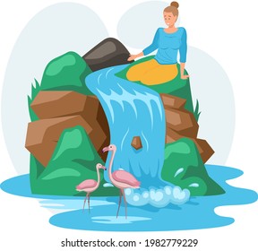 Waterfall in mountaines natural landscape in park. Female traveler enjoys beautiful nature, lake with birds flamingos. Tourist attraction of wonderful place of visit, beauteous site for excursions