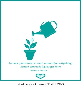 Watering can with flower