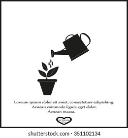 Watering can with flower