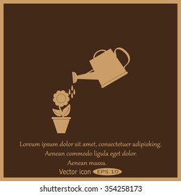 Watering can with flower