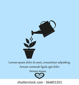 Watering can with flower