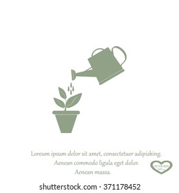 Watering can with flower
